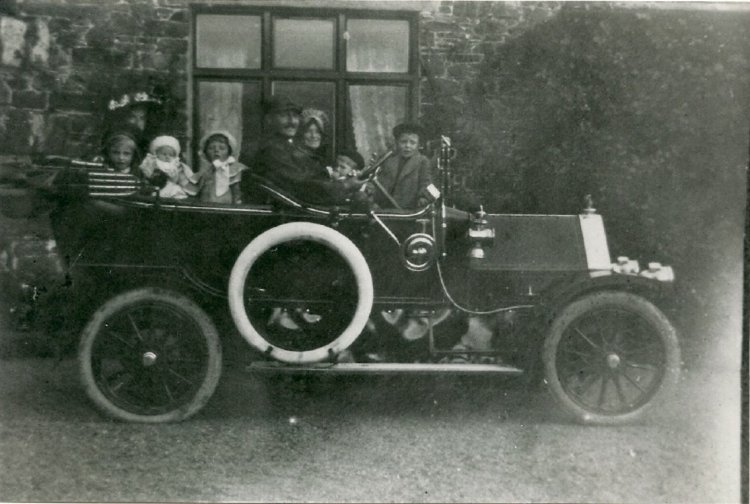 family in car