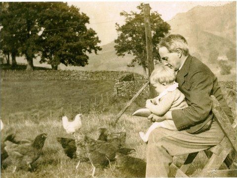 Rev Ben Ryllands in the vicarage garden with his son Val, 1930
